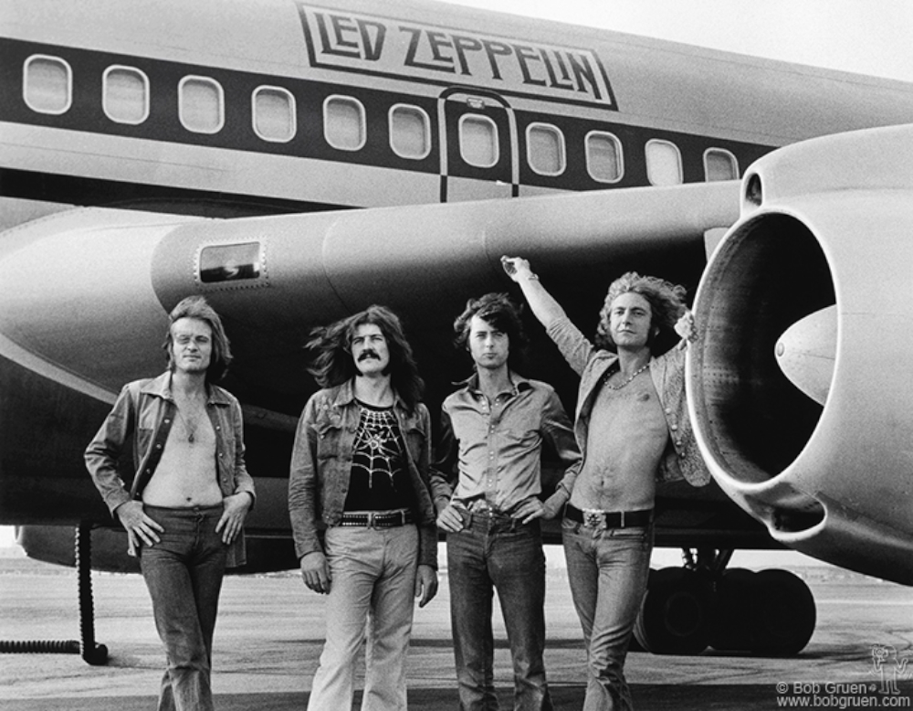 Led Zeppelin in front of a rented Boeing 720 called The Starship at the private Teterboro Airport in New Jersey (near New York City) on July 24, 1973. 
