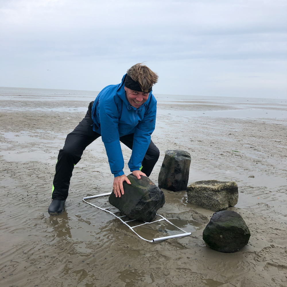 Nico Laan moving mud bricks